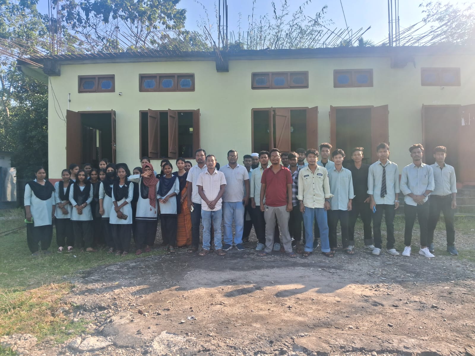 Students and faculty gathering at Tulshibil Degree College campus in Kokrajhar Assam